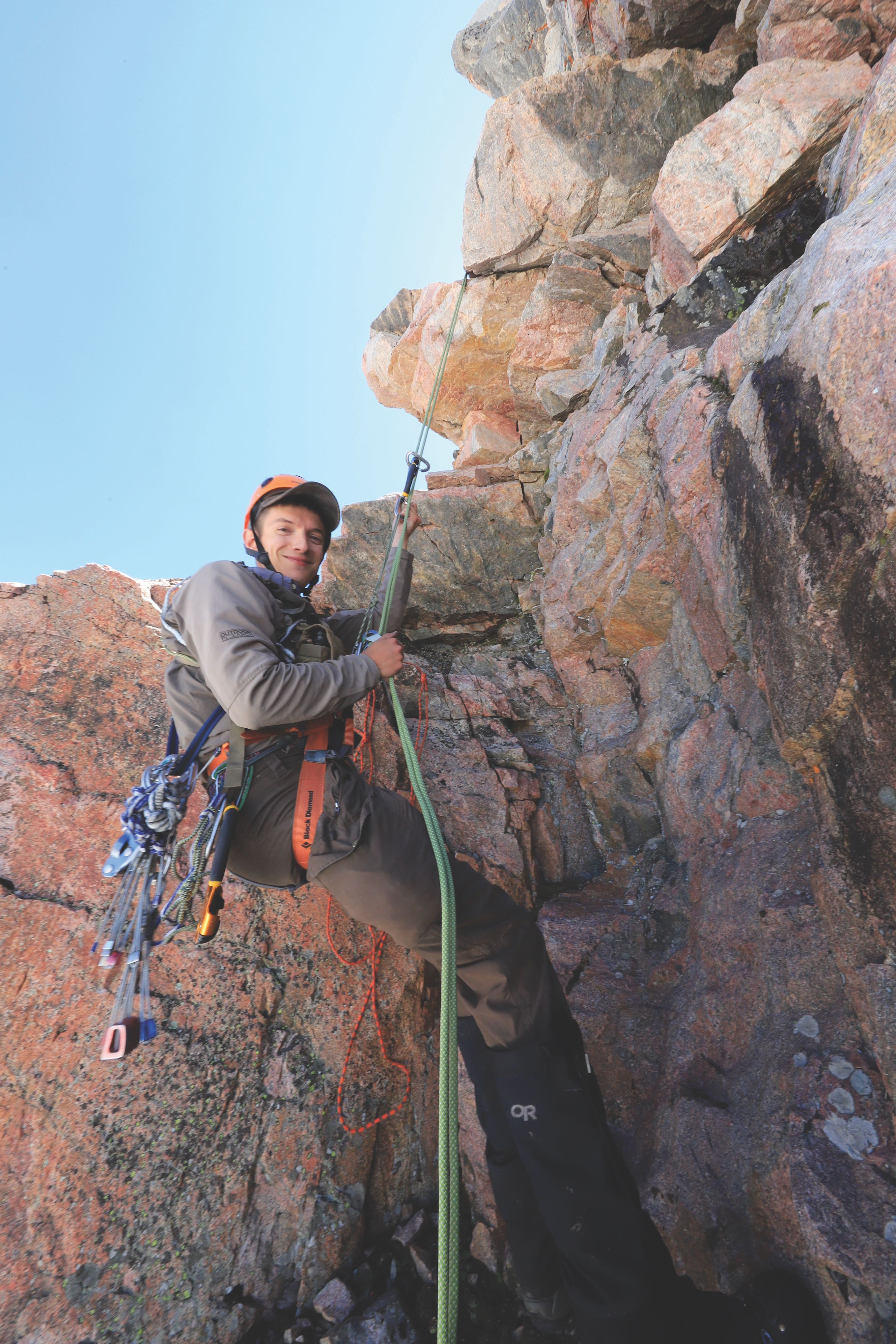 Carl Brown is no stranger to mountaineering, and his experience has proven invaluable throughout his study. Gaining access to black rosy finch nests requires skills in hiking, climbing and rappelling. Photo by Mark Gocke