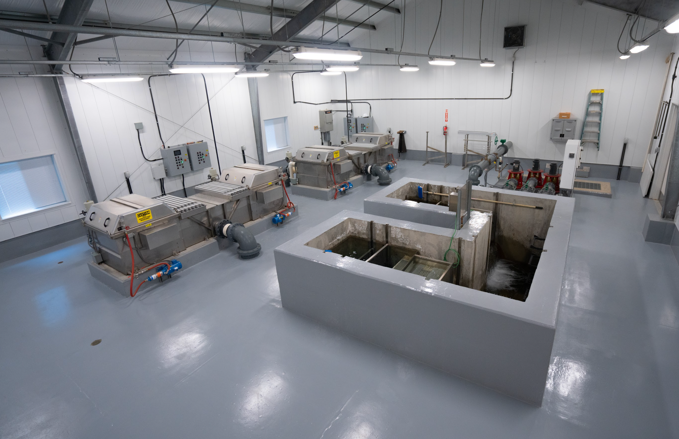 An inside look at the Ten Sleep Fish Hatchery water treatment building with uv water filtration units.