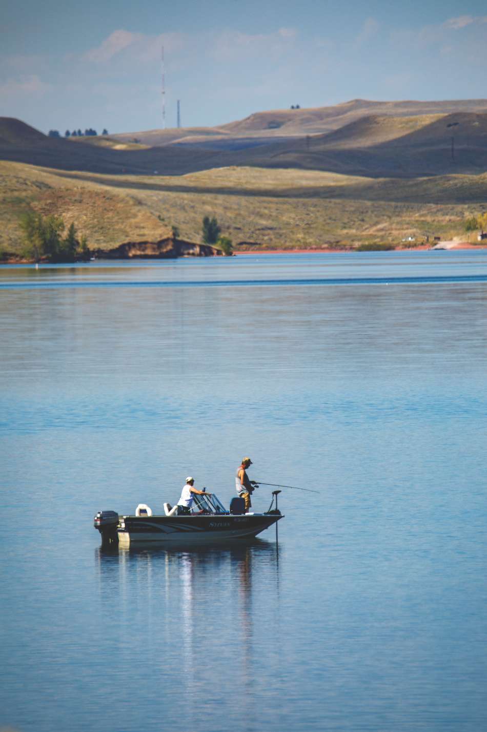 Fishing Lake Desmet Two anglers fish from a boat on Lake DeSmet.