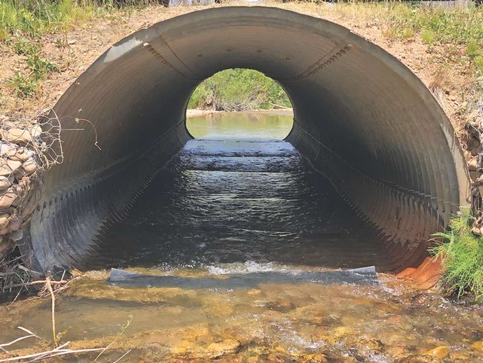 Baffles with this culvert in the Hoback area in western Wyoming reduce water velocity and increase water depths through the structure.