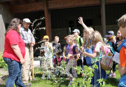 Students learn from game wardens and load up into the poach coach