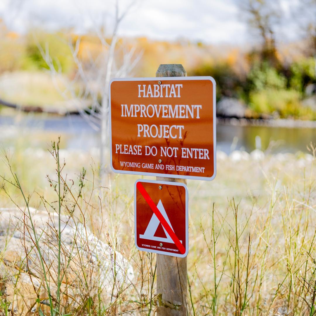 Sign that says "Habitat improvement project: please do not enter"