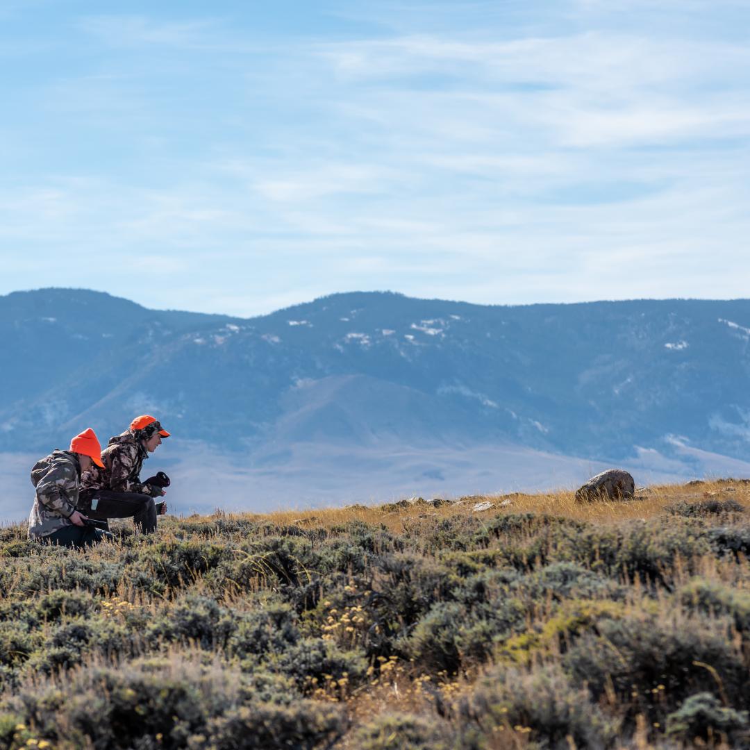 Hunters in sage brush