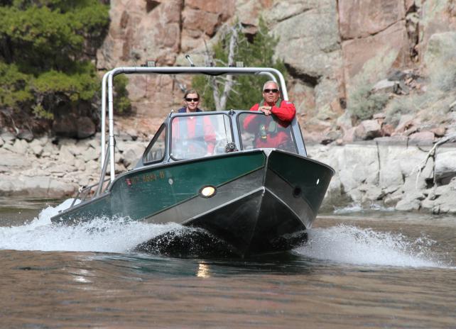 game wardens on watercraft