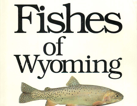 A book cover with a cutthroat trout on it that says Fishes of Wyoming in a serif font.