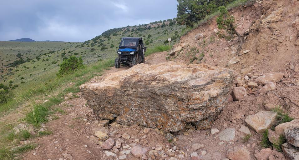 A large boulder blocks the Dry Medicine Lodge Creek Road