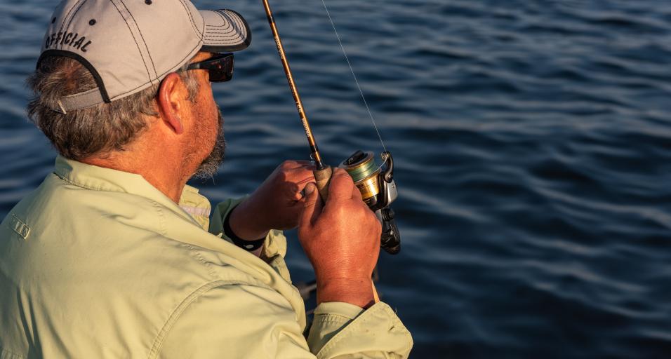 Robb Keith reels in a fish at Fontenelle Reservoir