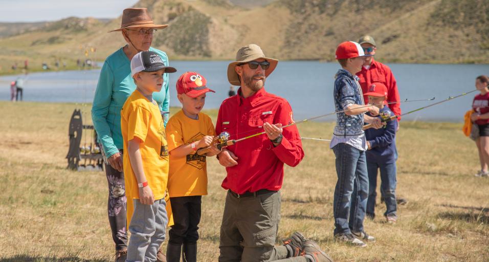 WGF Staff teaches casting lesson to kids