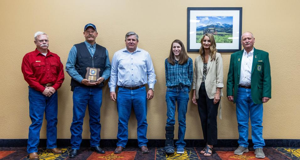 Wyoming Game and Fish leadership presents PRECorp with the 2024 Industry Wildlife Stewardship Award