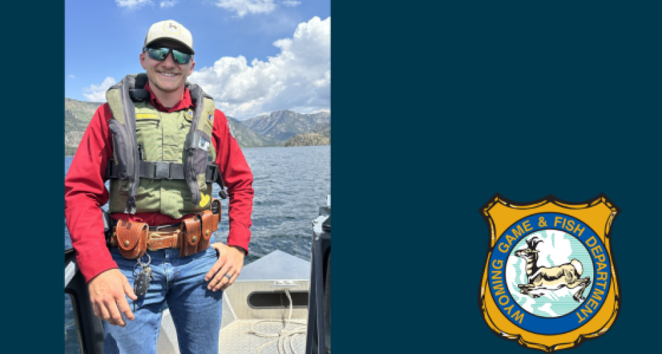 Wyatt Yapoujian stands on a boat in a Game and Fish uniform