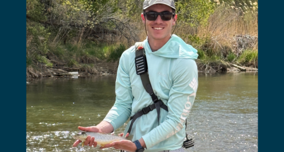 angler on the NPR with a fish
