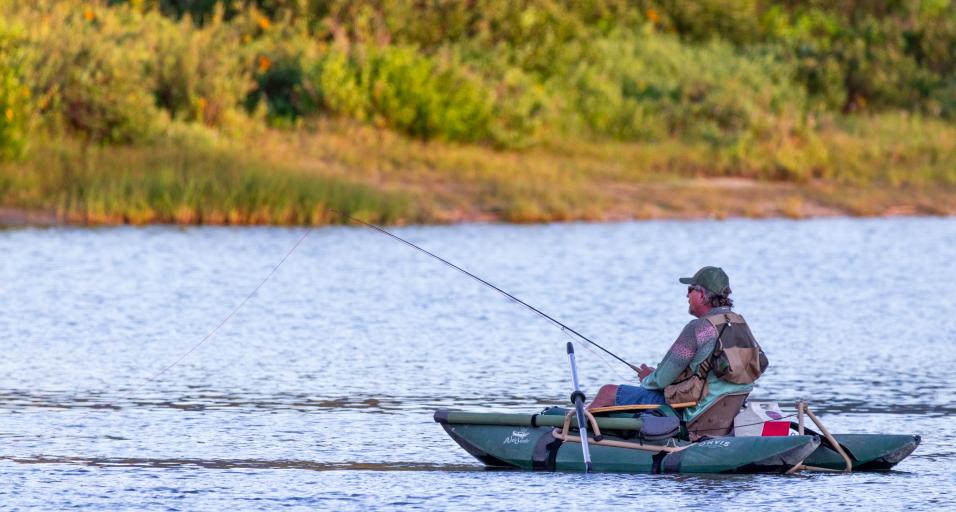 Man fishing in boat