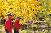 Allen Deru and Andy Countryman smile with Aspen trees in the background