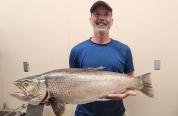 Shelby Holder of Kemmerer with his record-breaking tiger trout