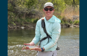 angler on the NPR with a fish