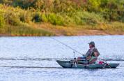 Man fishing in boat