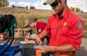 Biologists conducting tests at CWD checkstation