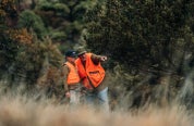 Father and son hunting in blaze orange