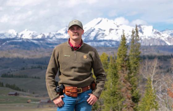 South Riverton Warden Dillion Bates stands in front of the Teton mountain range