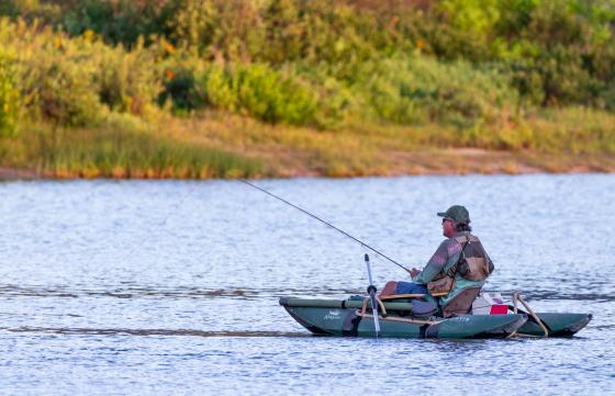 Man fishing in boat