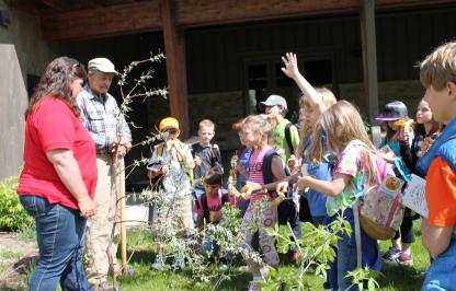 Students learn from game wardens and load up into the poach coach
