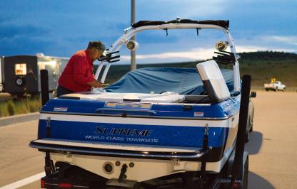 An AIS inspector ensures a watercraft is free of invasive mussels at a Game and Fish checkpoint.