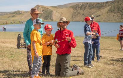 Casting Lessons WGF Staff teaches casting lesson to kids