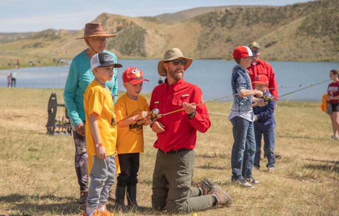 WGF Staff teaches casting lesson to kids