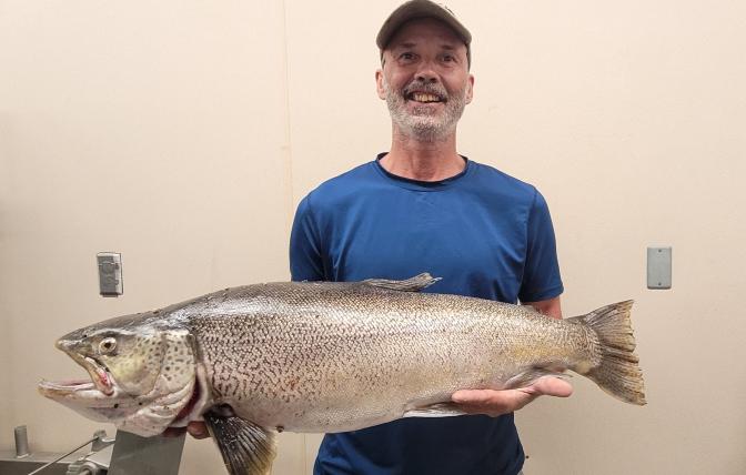 Shelby Holder of Kemmerer with his record-breaking tiger trout