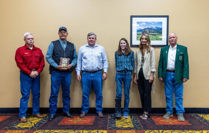 Wyoming Game and Fish leadership presents PRECorp with the 2024 Industry Wildlife Stewardship Award