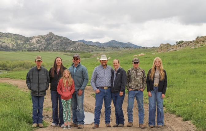 A portrait of the Turtle Rock Ranch Families on their ranch. 